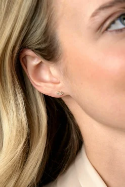 6mm ZINZI Gold 14 krt gouden fantasie oorknoppen met drie baguette geslepen witte zirkonia's en twee ronde zirkonia's ZGO520