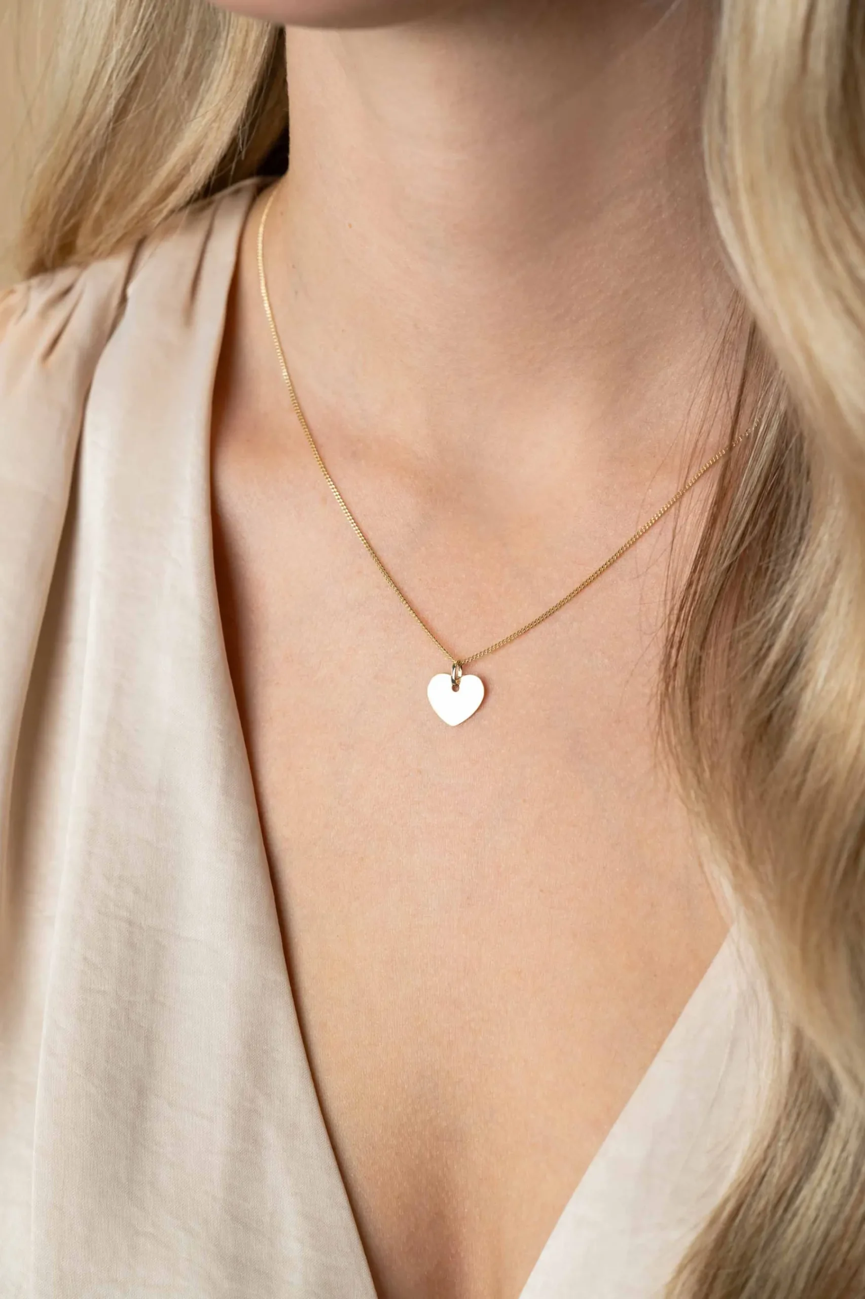 12mm ZINZI Gold 14 krt gouden hanger met trendy glanzend hartje van 12mm ZGH396-12 (zonder collier)