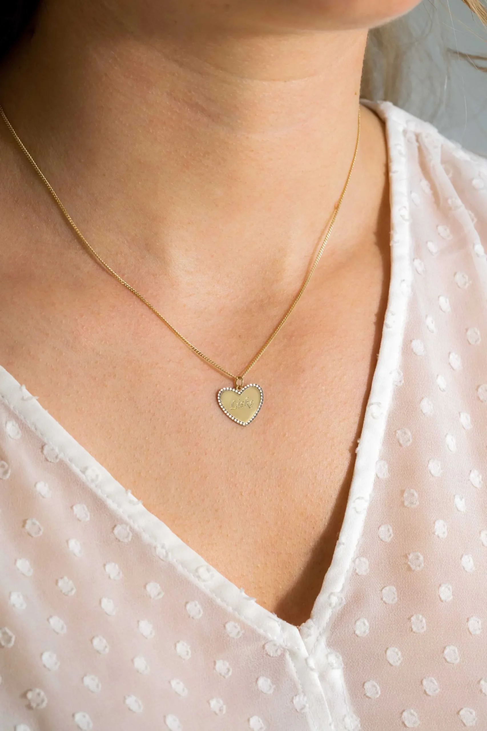 15mm ZINZI Gold 14 krt gouden hanger met glanzend hartje van 15mm en met chique witgouden parelrand ZGH364-15 (zonder collier)