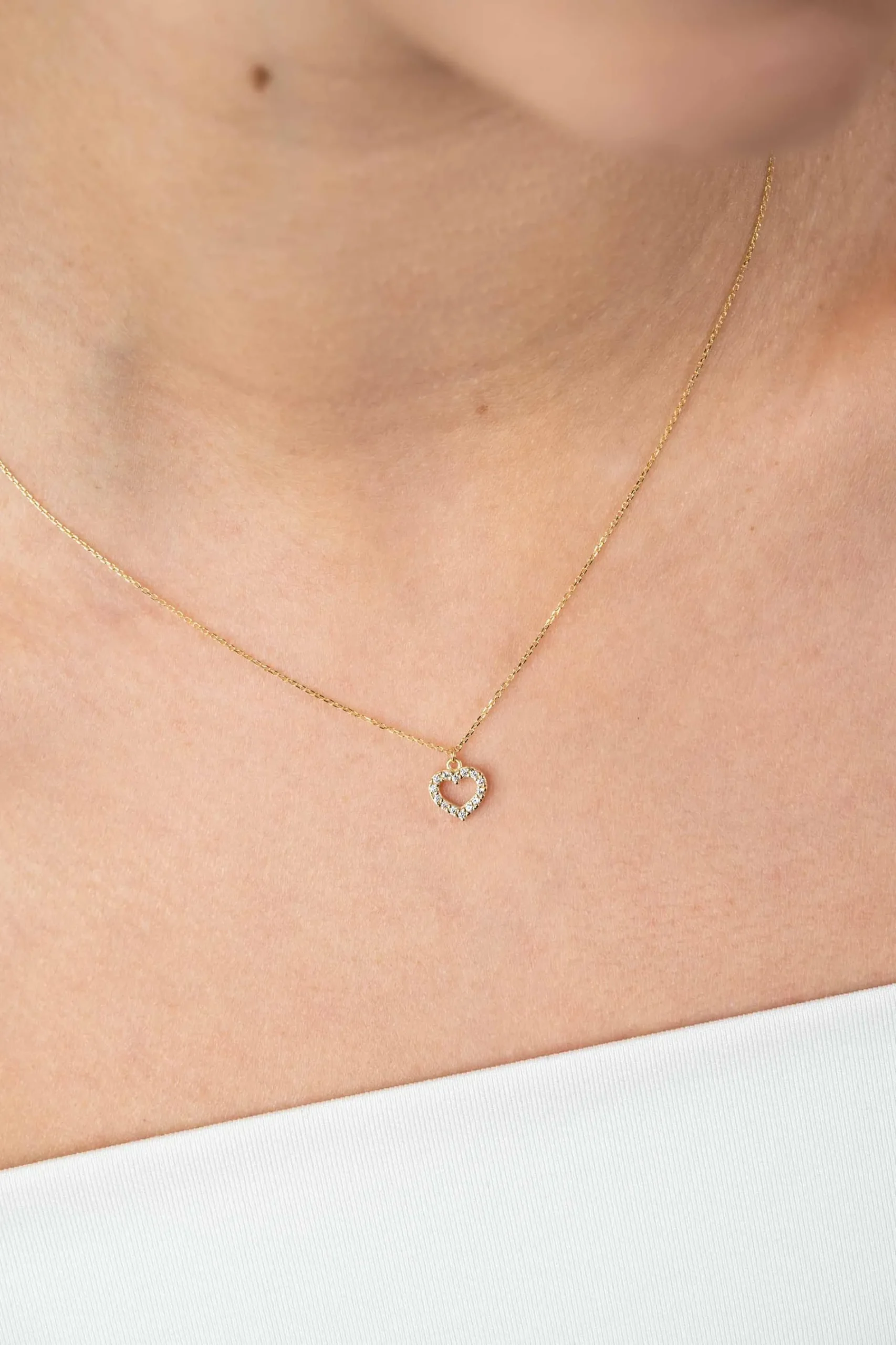 ZINZI Gold 14 krt gouden anker ketting met sierlijk open hartje (7mm), bezet met witte zirconia's 40-42,5cm ZGC450
