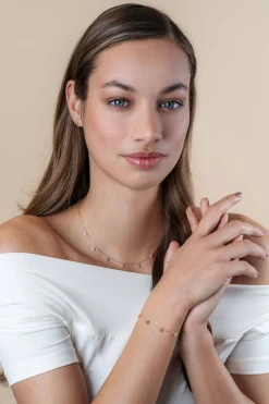 ZINZI Gold 14 krt gouden armband met zeven ronde hangertjes, bezet met witte zirconia's 15,5-18,5cm ZGA451