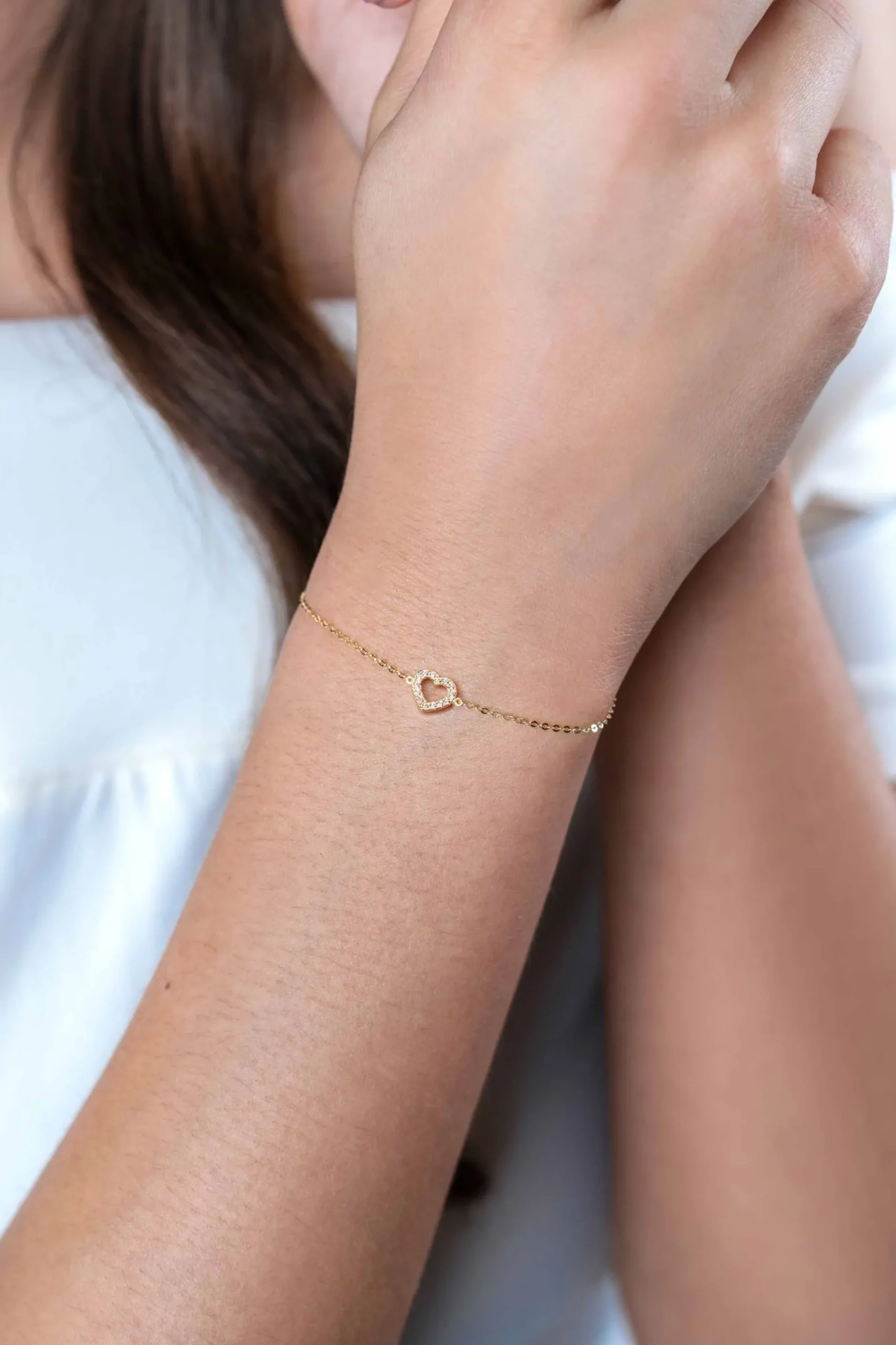 ZINZI Gold 14 krt gouden armband met sierlijk open hartje (7mm), bezet met witte zirconia's 16,5-19,5cm ZGA450