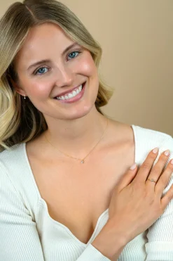ZINZI Gold 14 krt gouden ring bezet met ronde witte zirconia 4,5mm breed ZGR371