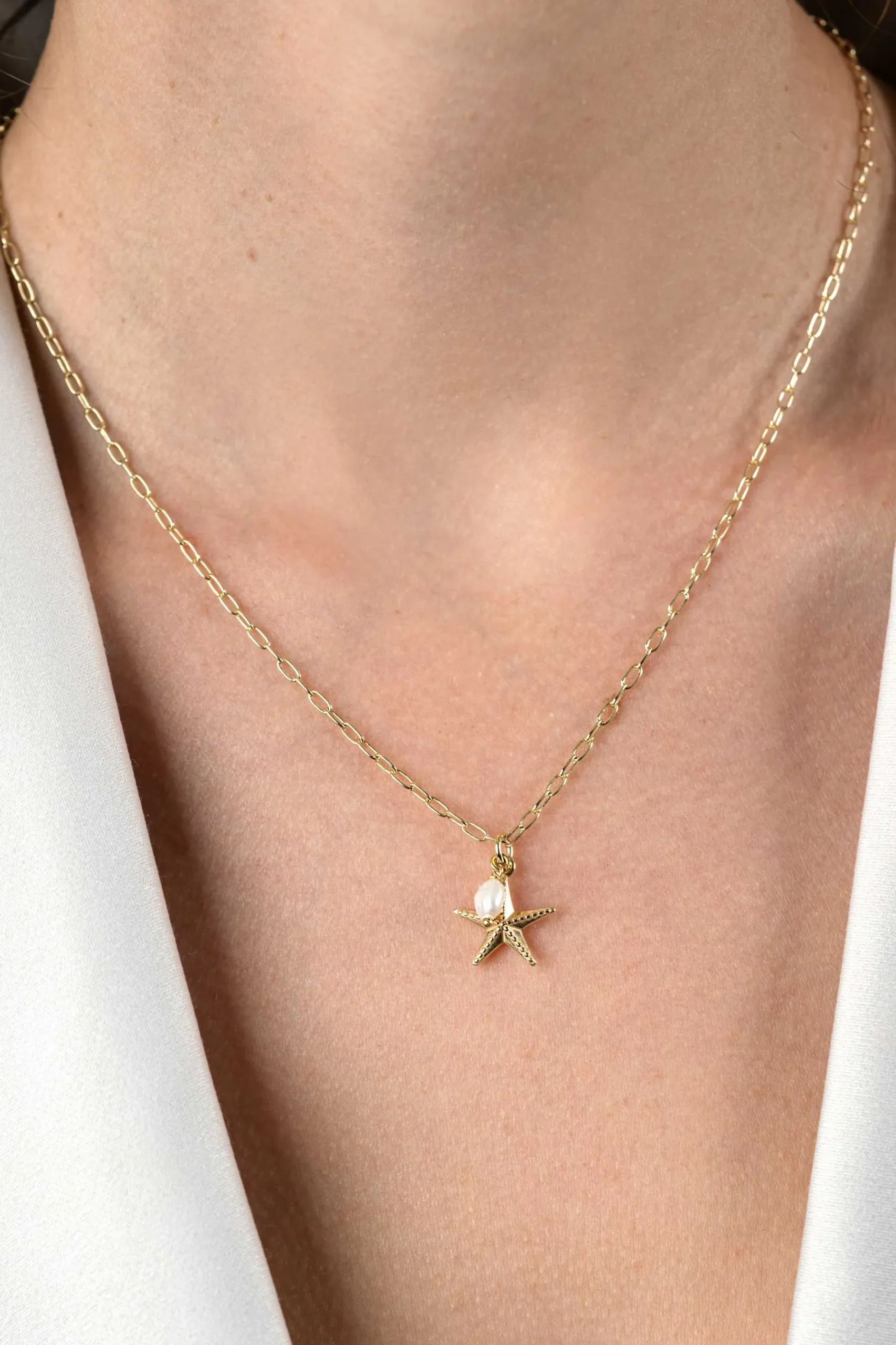 ZINZI gold plated zilveren ketting met paperclip-schakels en grote zeester hanger met ovale witte zoetwaterparel 40-45cm ZIC2641