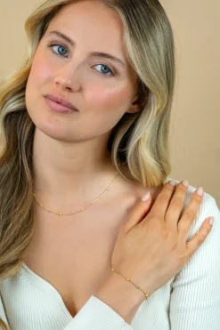 ZINZI gold plated zilveren fantasie armband met 5 geelgroene donuts en glanzende bolletjes 17-19,5cm ZIA2508