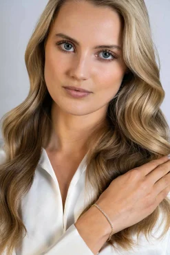 ZINZI gold plated zilveren armband, in het midden bezet met 21 witte zirconia's 16-19cm ZIA2370Y