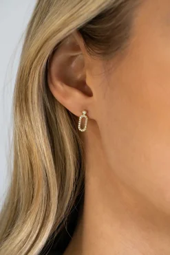 ZINZI gold plated zilveren oorstekers (13mm) met een open ovale vorm bezet met witte zirconia's ZIO2398Y