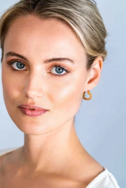 ZINZI gold plated zilveren oorringen 17mm hartvorm met witte zirconia's ZIO2195Y