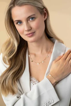 ZINZI gold plated zilveren schakelarmband met bolletjes en drie gladde hartjes 17-20cm ZIA2531G
