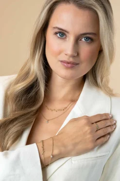 ZINZI gold plated zilveren aanschuifring met bolletjes scheen en drie ronde zettingen bezet met witte zirconia ZIR2569