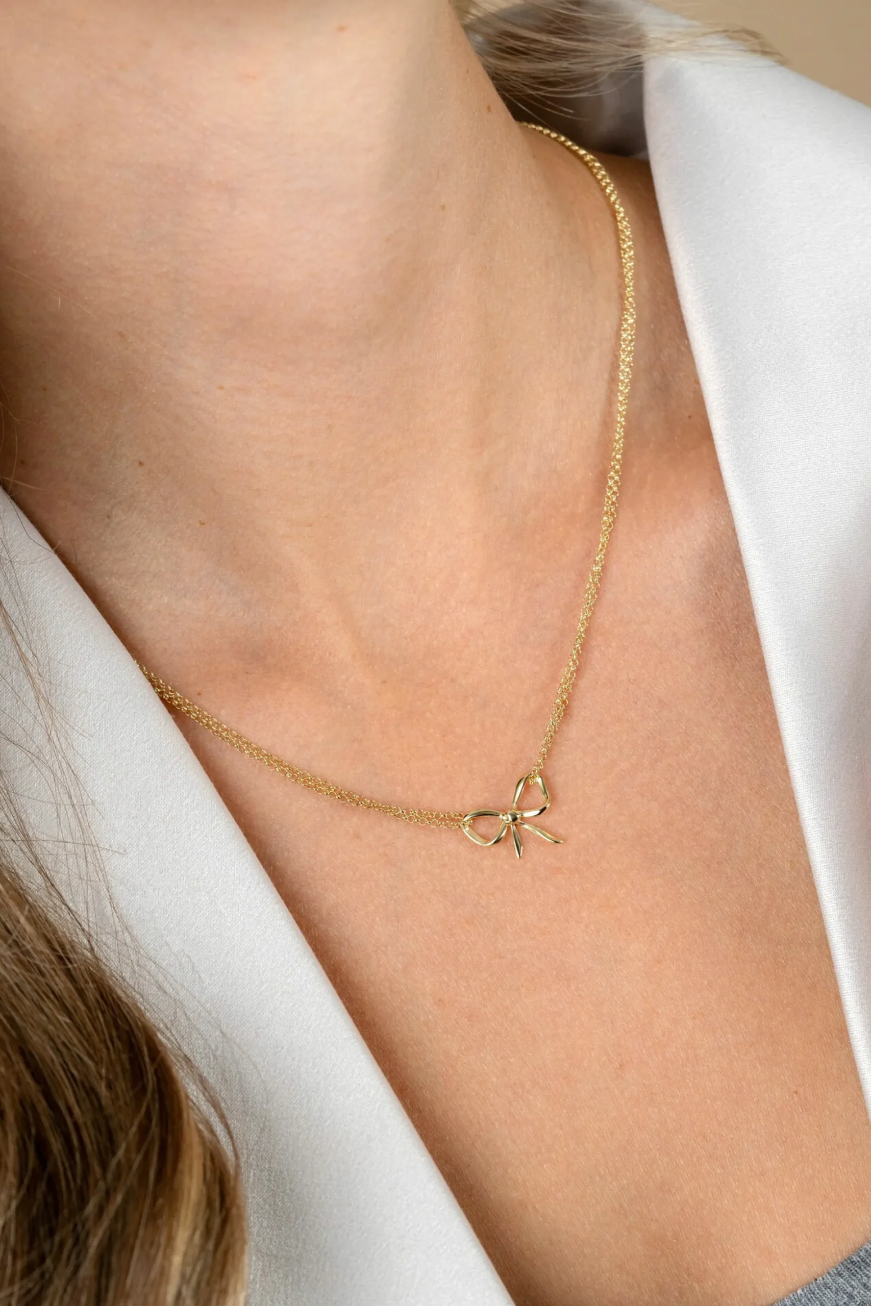 ZINZI gold plated zilveren multi-look ketting met sierlijke strik 40-43cm ZIC2677