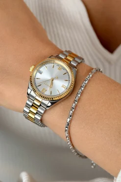 ZINZI Iconic horloge 30mm met datum, goudgekleurde gekartelde rand, zilverkleurige wijzerplaat en stalen bicolor schakelband ZIW2233