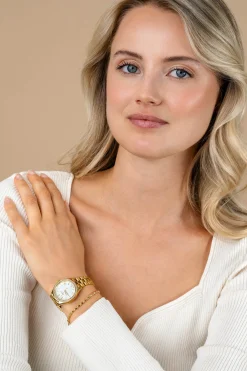 ZINZI Tresor horloge 32mm bezet met witte zirkonia's, parelmoer wijzerplaat en goudkleurige stalen kast en schakelband ZIW2434