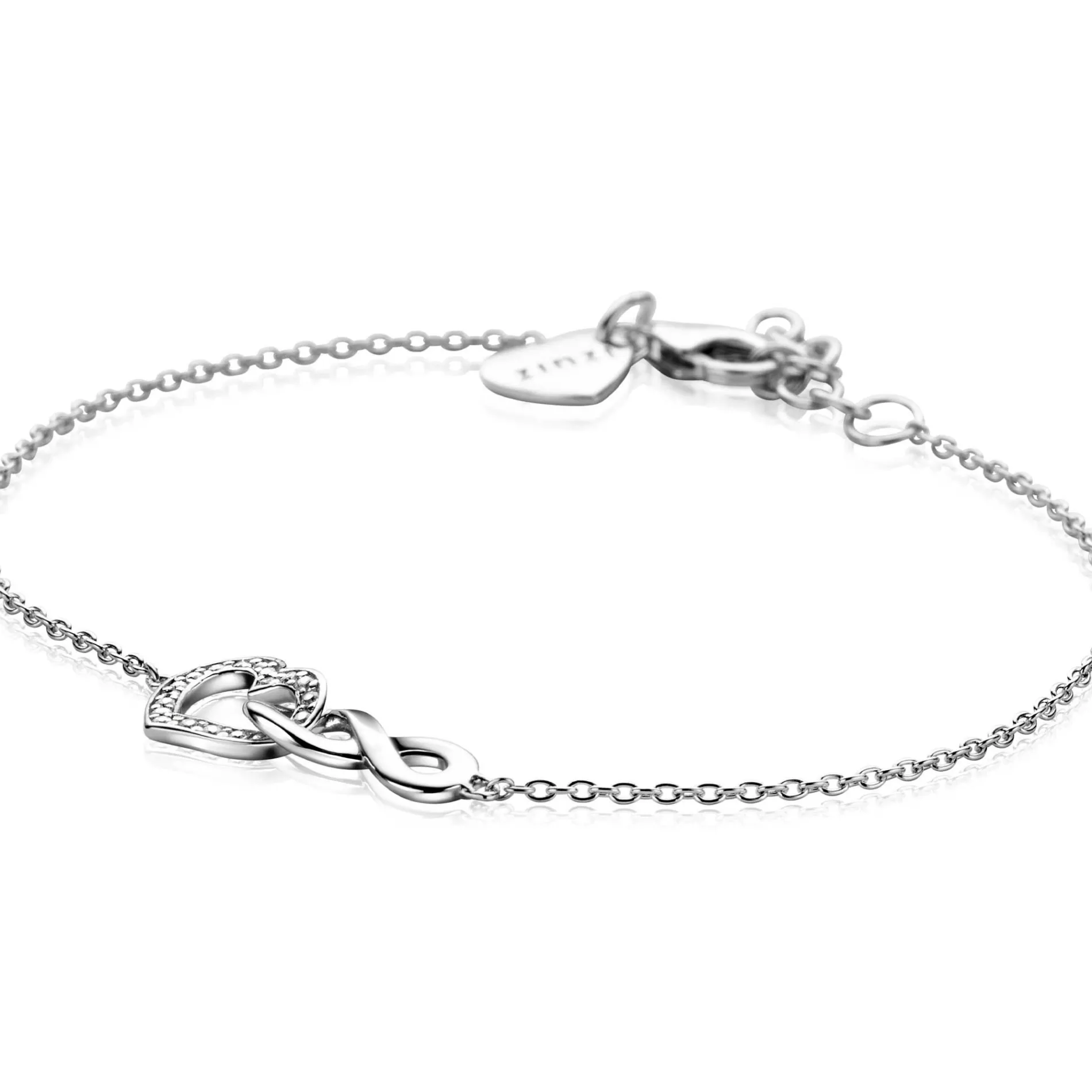 ZINZI zilveren armband met Infinity teken verbonden met een open hart, bezet met witte zirconia's 17-19cm ZIA2596