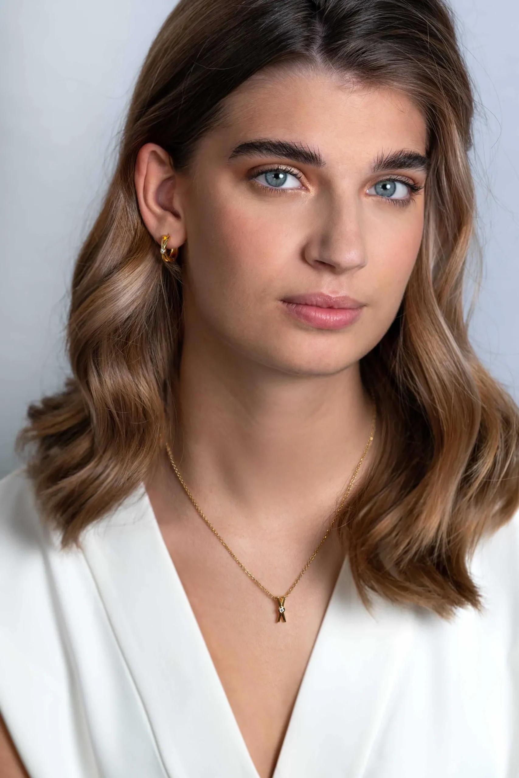 ZINZI zilveren oorringen extra 14K geel verguld met X-vorm en witte ronde zirconia 17x5mm ZIO2194Y