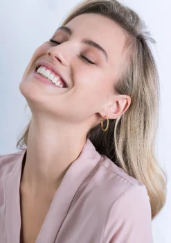 ZINZI zilveren oorringen 14K geelverguld gedraaid motief 25 x 2mm ZIO2129G