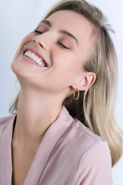 ZINZI zilveren oorringen 14K geelverguld gedraaid motief 25 x 2mm ZIO2129G