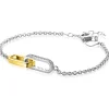 ZINZI zilveren schakelarmband met twee verbonden ovale schakels: ene gold plated, ander bezet met witte zirkonia's ZIA2758