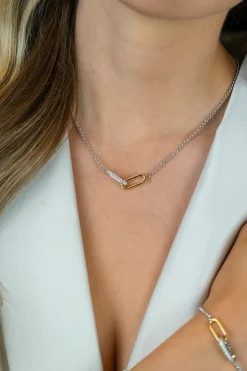 ZINZI zilveren schakelketting met twee verbonden ovale schakels: één gold plated, de ander bezet met witte zirkonia's 42-45cm ZIC2758