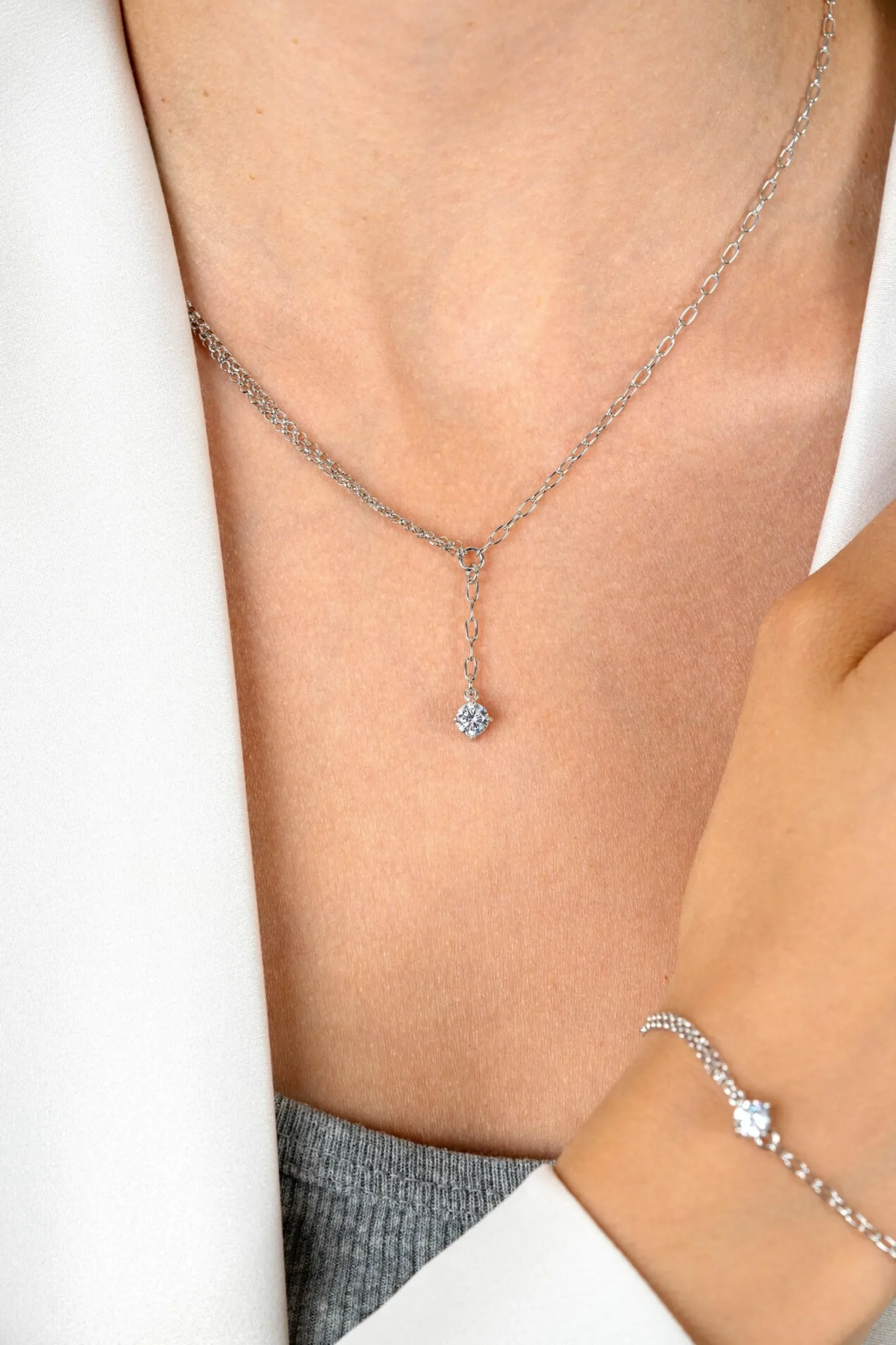 ZINZI zilveren Y-collier met subtiele schakels, bungelend witte ronde zirkonia 42-45cm ZIC2660